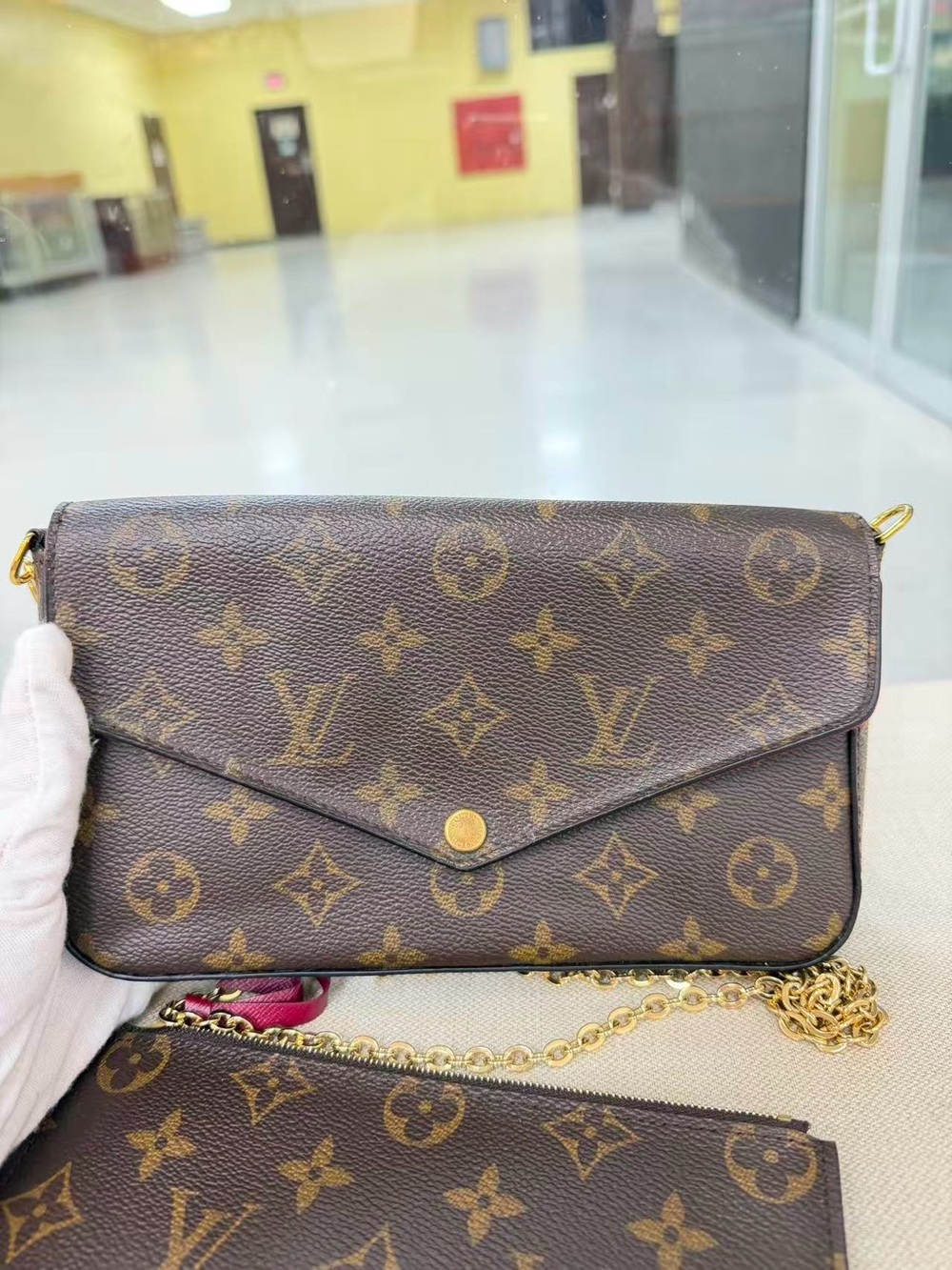 Louis Vuitton Monogram Canvas Envelope Crossbody in Brown and Gold